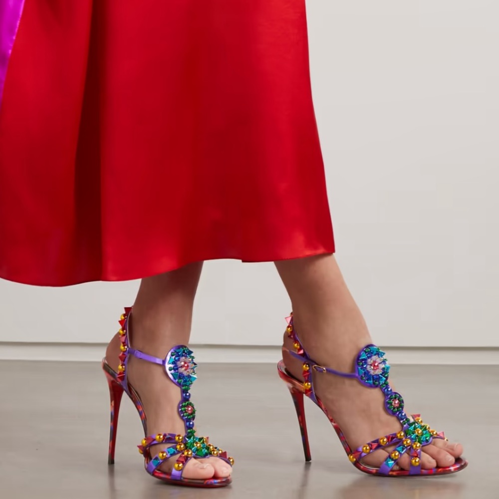 CHRISTIAN LOUBOUTIN
Goldora 100 studded patent-leather sandals